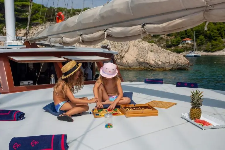 Kids playing on the bow of the gulet